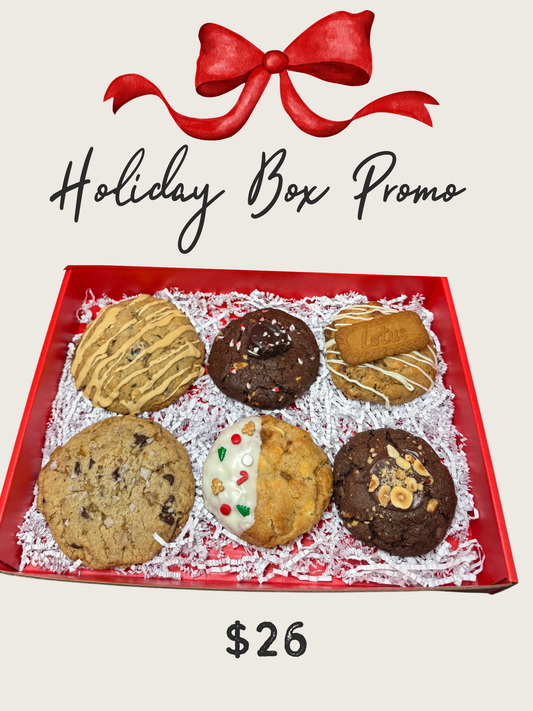 Box of assorted cookies with a red ribbon and 'Holiday Box Promo' text on a light background. Price: $26